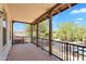 Balcony with black metal railing offers scenic neighborhood views on a sunny day at 20507 W Daniel Pl, Buckeye, AZ 85396