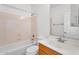 Bathroom with white toilet, bathtub and sink at 20507 W Daniel Pl, Buckeye, AZ 85396