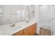 Bathroom features a double sink vanity, medicine cabinet, and shower/tub combo at 20507 W Daniel Pl, Buckeye, AZ 85396