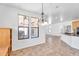 Dining room area with views into the kitchen and living area at 20507 W Daniel Pl, Buckeye, AZ 85396