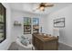 Charming home office featuring a large desk and bright natural light at 20507 W Daniel Pl, Buckeye, AZ 85396