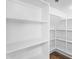 Walk-in pantry with white shelving at 20507 W Daniel Pl, Buckeye, AZ 85396