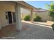 Private back patio with large patio featuring desert landscaping and access to the indoor living space at 20641 N 110Th Ave, Peoria, AZ 85373