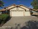 Charming single-story home with a three-car garage and well-manicured landscaping at 20641 N 110Th Ave, Peoria, AZ 85373