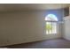 Bright living room with carpet, large windows, and neutral walls at 20641 N 110Th Ave, Peoria, AZ 85373