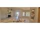 Bright living room boasts a fireplace and sliding door access to the outdoors at 20641 N 110Th Ave, Peoria, AZ 85373