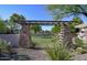 Community pergola over desert landscaping and green space on a bright day at 21039 E Avenida Del Valle --, Queen Creek, AZ 85142