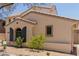 A view of the home's facade with an arched window and desert landscaping at 21039 E Avenida Del Valle --, Queen Creek, AZ 85142