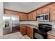 A kitchen featuring stainless steel appliances, ample storage, and a clean, functional design at 21039 E Avenida Del Valle --, Queen Creek, AZ 85142