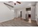 Open-concept living area that connects seamlessly to other rooms, with a smooth transition between flooring types at 21039 E Avenida Del Valle --, Queen Creek, AZ 85142