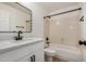 Bright bathroom features a black faucet and hardware, plus white cabinetry and bathtub at 2226 N Gentry --, Mesa, AZ 85213