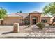 Charming single-story home featuring desert landscaping, a clay tile roof, and an attached two-car garage at 2226 N Gentry --, Mesa, AZ 85213