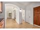Hallway leading to the bathroom is designed with arches and pillars at 2226 N Gentry --, Mesa, AZ 85213
