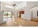 Spacious living room boasts tile floors, high ceilings, and seamless indoor-outdoor living at 2226 N Gentry --, Mesa, AZ 85213