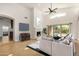 Cozy living room with fireplace, stylish decor, and seamless access to the backyard at 2226 N Gentry --, Mesa, AZ 85213