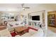 Open-concept living room flowing into dining area, perfect for entertaining and everyday living at 23787 W Yavapai St, Buckeye, AZ 85326