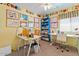 A cheerful office space filled with personal touches, colorful decor, and functional workstations at 23787 W Yavapai St, Buckeye, AZ 85326