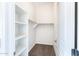 Walk-in closet with built-in shelves and rack for maximum organization at 2698 E Denim Trl, San Tan Valley, AZ 85143