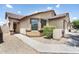 Charming single-story home with a tile roof, desert landscaping, and a welcoming front entrance at 2698 E Denim Trl, San Tan Valley, AZ 85143