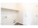 Clean laundry room with hookups and door leading to the exterior at 2698 E Denim Trl, San Tan Valley, AZ 85143