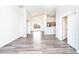 Spacious living room with vaulted ceilings, wood floors, and an open floor plan at 2698 E Denim Trl, San Tan Valley, AZ 85143