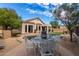 Landscaped backyard featuring a pool, patio, and comfortable seating area for outdoor enjoyment at 3055 N Red Mtn # 77, Mesa, AZ 85207