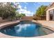 Beautiful pool and patio with table and chairs, perfect for outdoor entertaining and leisure at 3055 N Red Mtn # 77, Mesa, AZ 85207