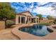 Inviting backyard featuring a private pool, covered patio, and well-maintained landscaping for outdoor relaxation at 3055 N Red Mtn # 77, Mesa, AZ 85207