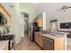 Functional kitchen with a breakfast bar, modern appliances, and lots of storage at 3055 N Red Mtn # 77, Mesa, AZ 85207