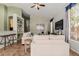Open-concept living room with stylish furnishings, soft decor, and seamless flow to other living spaces at 3055 N Red Mtn # 77, Mesa, AZ 85207
