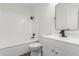 Bathroom with a tub, shower, and vanity with black hardware and fixtures at 350 N 88Th St, Mesa, AZ 85207