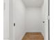 Walk-in closet with laminate flooring and neutral-toned walls at 350 N 88Th St, Mesa, AZ 85207