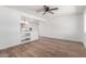 Bright living room featuring stylish wood-look floors, white walls and open concept floorplan at 350 N 88Th St, Mesa, AZ 85207