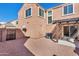 Cozy backyard featuring a concrete patio, gravel landscaping, and partial pergola at 3535 E Erie St, Gilbert, AZ 85295