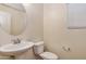 Bathroom featuring a sleek pedestal sink and modern fixtures at 3535 E Erie St, Gilbert, AZ 85295