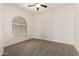 Cozy bedroom with a large window, carpeted flooring, and ample natural light at 3715 S Skyline Dr, Gilbert, AZ 85297