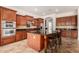 Beautiful kitchen featuring stainless steel appliances, granite counters, and custom wood cabinets at 3715 S Skyline Dr, Gilbert, AZ 85297
