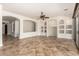Open floor plan showcasing neutral walls, tile flooring, and custom built-in shelving niches at 3715 S Skyline Dr, Gilbert, AZ 85297