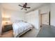 Comfortable bedroom with ceiling fan, closet, and natural light creates a relaxing space at 37222 N Tom Darlington Dr # 15, Carefree, AZ 85377