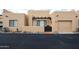 Charming tan stucco home features a private courtyard and attached one car garage at 37222 N Tom Darlington Dr # 15, Carefree, AZ 85377