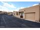 Tan stucco home in a quiet neighborhood with private courtyard and garage at 37222 N Tom Darlington Dr # 15, Carefree, AZ 85377