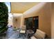 Cozy covered patio with comfortable seating and a peaceful ambiance, perfect for relaxation at 37222 N Tom Darlington Dr # 15, Carefree, AZ 85377