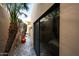 Scenic walkway lined with lush plants creates a tranquil and inviting path at 37222 N Tom Darlington Dr # 15, Carefree, AZ 85377