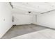 Spacious and well-lit garage with ample room for parking and storage, offering convenience and functionality at 37582 W San Clemente St, Maricopa, AZ 85138