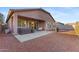 Spacious backyard featuring a covered patio, hot tub, seating area, and low-maintenance landscaping, great for outdoor enjoyment at 3865 E Dogwood Pl, Chandler, AZ 85286