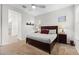 Cozy bedroom featuring a ceiling fan, carpet, and bedside lamps for a relaxing and comfortable space at 3865 E Dogwood Pl, Chandler, AZ 85286