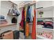 Organized closet with ample shelving, hanging space, and luggage storage for optimal storage solutions at 3865 E Dogwood Pl, Chandler, AZ 85286