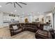 Spacious living room featuring an open layout, adjacent to the kitchen and dining area at 3865 E Dogwood Pl, Chandler, AZ 85286