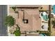 Aerial view showcasing the home's layout, backyard pool, and outdoor seating areas at 42 S Nevada Way, Gilbert, AZ 85233