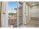 Nice balcony view with a sliding glass door and white cabinets in the background at 42 S Nevada Way, Gilbert, AZ 85233